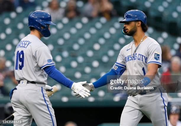 Melendez of the Kansas City Royals is congratulated by Michael Massey after hitting a solo home run against the Detroit Tigers during the first...