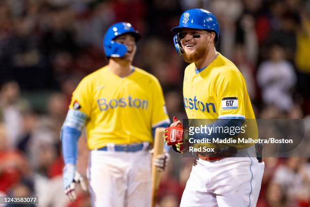 Alex Verdugo of the Boston Red Sox reacts with Triston Casas of the Boston Red Sox after hitting a home run during the sixth inning of a game against...