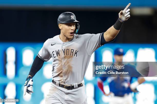 Aaron Judge of the New York Yankees runs the bases as he hits his 61st home run of the season in the seventh inning against the Toronto Blue Jays at...