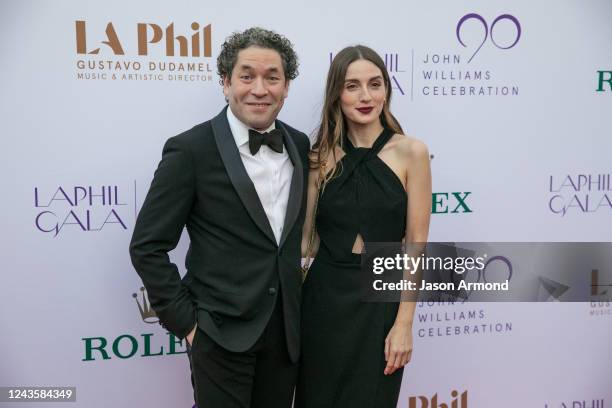 Gustavo Dudamel and wife Eloísa Maturén pose on the red carpet at