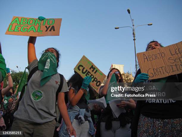 Legal Abortion Now" can be read on a cardboard when hundreds of women, wearing green scarf, carry out a demonstration demanding "Legal, safe and free...