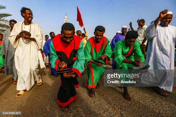 Sudanese take part in a parade for the upcoming birthday of Prophet Muhammad, known as al-Mawlid al-Nabawi or al-Mawlid, in Khartoum, Sudan, on...