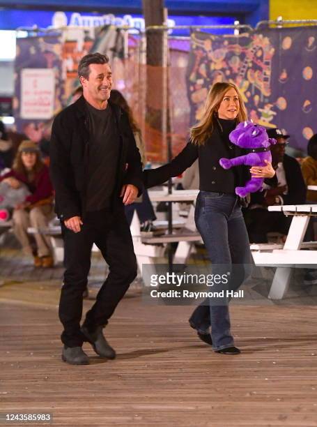 Jon Hamm and Jennifer Aniston are seen filming "The Morning Show" at Coney Island on September on September 28, 2022 in New York City.