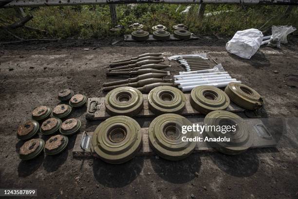 Ukrainian mine clearance team gather and conduct mine and ammunition clearance after Russian Forces withdrawal from the Izyum city, at fields around...