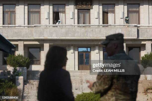 Soldier on the North Korean side looks through binoculars as US Vice President Kamala Harris visits the demilitarized zone separating North and South...