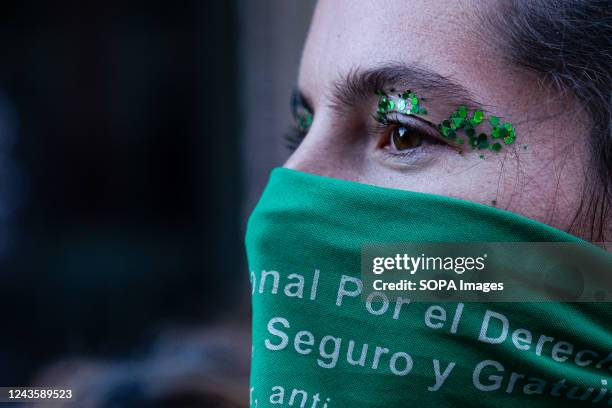 Woman wears a green handkerchief during the demonstration. On 28th September, demonstrators gathered for the Global day of action for the right to...