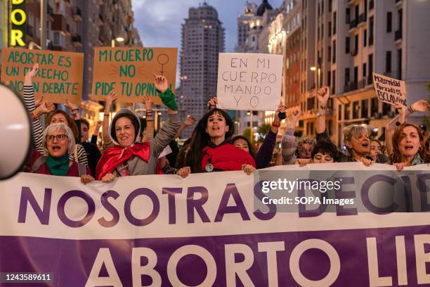 Women chant slogans while holding placards and a banner during the demonstration. On 28th September, demonstrators gathered for the Global day of...
