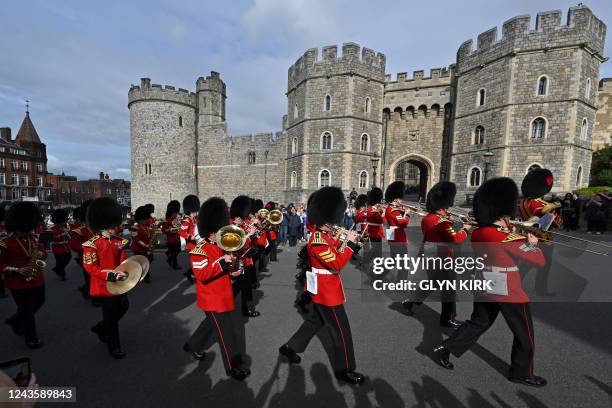 The band of the Grenadier Guards perform outside Windsor Castle in Windsor, west of London on September 29 as the Castle re-opened to visitors...