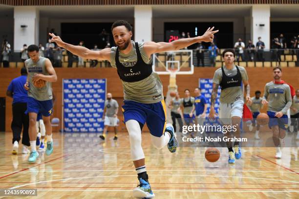 Stephen Curry of the Golden State Warriors warms up during practice and media availability at Minato Sports Complex on September 29, 2022 in Tokyo,...