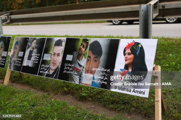 Fans of Iran protest outside the stadium following recent events in their home county surrounding the death of Masha Amini ahead of the International...