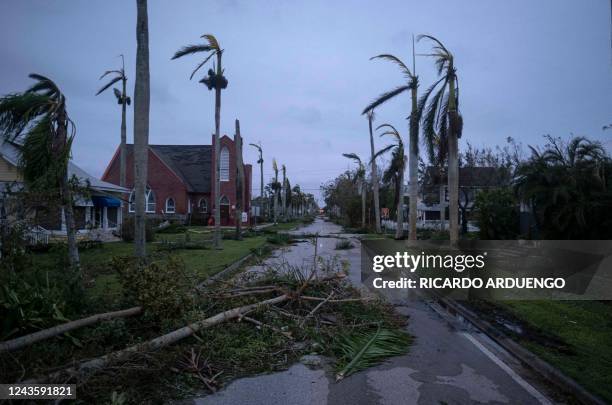 Debris litters a street in the aftermath of Hurricane Ian in Punta Gorda, Florida on September 29, 2022. - Hurricane Ian left much of coastal...