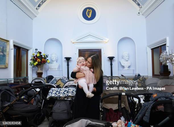 Eimear Lawlor and her five month old daughter Erin Realtin Lawlor, from Monasterevin, at a reception and Latching On morning in Áras an Uachtaráin,...
