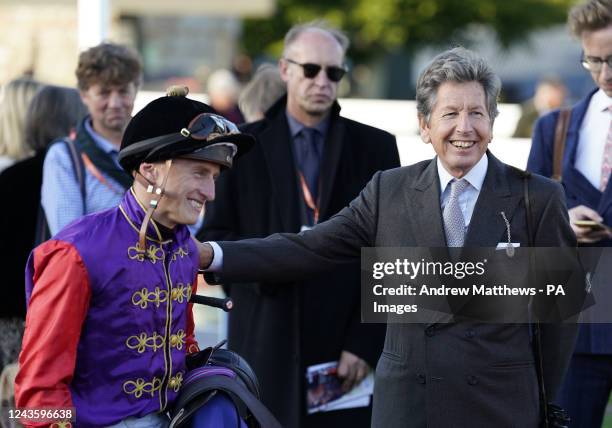 Tom Marquand speaks to John Warren after riding Educator in the Radcliffe & Co Handicap at Salisbury Racecourse. Picture date: Thursday September 29,...