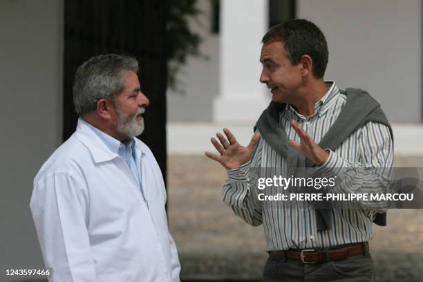 Brazilian President Luiz Inacio Lula da Silva chats with Spanish Prime Minister Jose luis Rodriguez Zapatero at the Quintos de Mora ranch near...