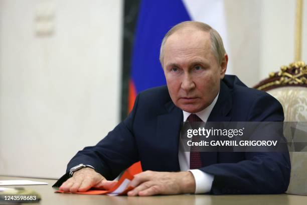 Russian President Vladimir Putin chairs a Security Council meeting via a video link in Moscow on September 29, 2022.