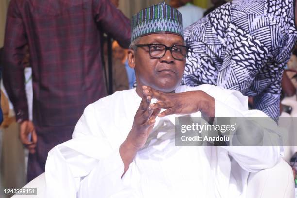 Nigerian businessman Aliko Dangote attends a ceremony as 18 candidates signed a pledge to ensure peaceful elections in Abuja, Nigeria on September...