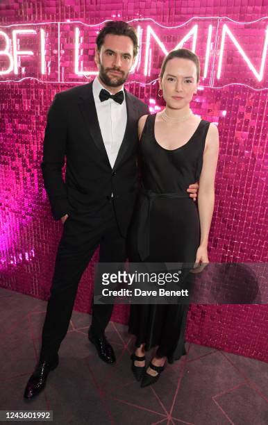 Tom Bateman and Daisy Ridley attend the BFI Luminous Fundraising Gala at The Londoner Hotel on September 29, 2022 in London, England.