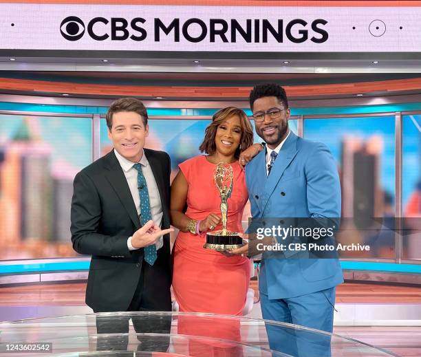 Co-hosts Tony Dokoupil, Gayle King, Nate Burleson hold their Emmy for Outstanding Live News Program on September 29, 2022 in New York City.