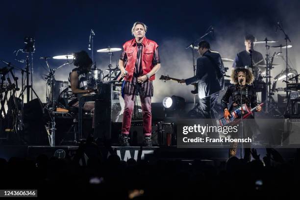 Win Butler and Regine Chassagne of the Canadian band Arcade Fire perform live on stage during a concert at the Mercedes-Benz Arena on September 29,...