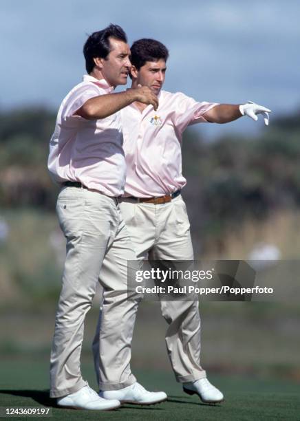 Severiano Ballesteros of Team Europe in conversation with teammate Jose Maria Olazabal during a practice round before the Ryder Cup at Kiawah Island...