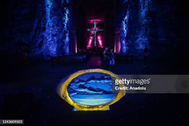 Group of foreign tourists and locals visit The Salt Cathedral of Zipaquira, inside a salt mine that has been exploited since 1801, in Zipaquira,...
