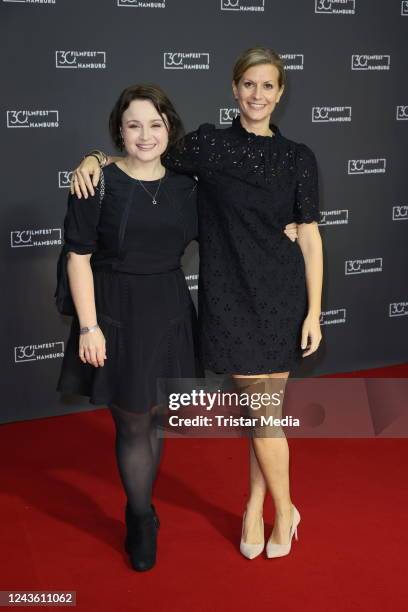 Carolin Walter and Theresa Underberg attend the opening of the Hamburg Film Festival at CinemaxX Dammtor on September 29, 2022 in Hamburg, Germany.