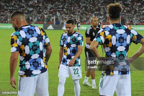 Algerian players are pictured during a friendly football match with Guinea on September 23, 2022 in Oran. - Morocco has asked German sportswear giant...