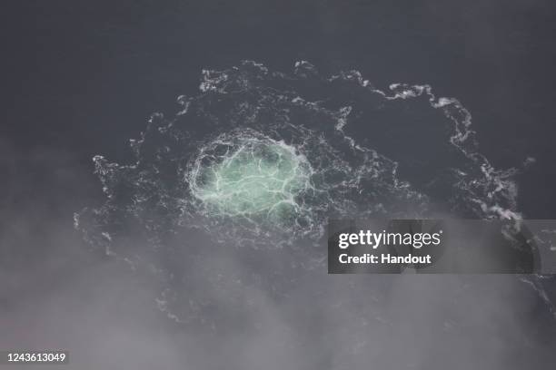 In this Handout Photo provided by Swedish Coast Guard, the release of gas emanating from a leak on the Nord Stream 2 gas pipeline in the Baltic Sea...