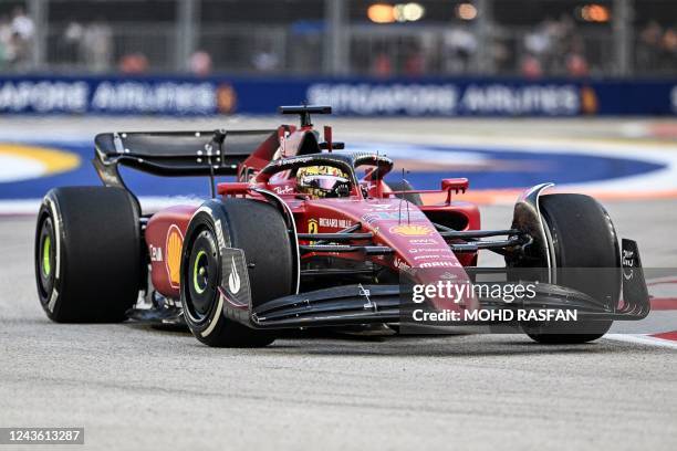 Ferrari's Monegasque driver Charles Leclerc drives during a practice session ahead of the Formula One Singapore Grand Prix night race at the Marina...