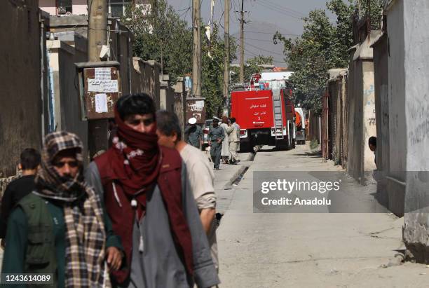 Security forces stand guard after a suicide bomb attack on an education institute in Kabul, Afghanistan on September 30, 2022. A suicide bomber blew...