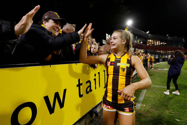 Sophie Locke of the Hawks celebrates with fans during the 2022 S7 AFLW Round 06 match between the Hawthorn Hawks and the West Coast Eagles at Skybus...