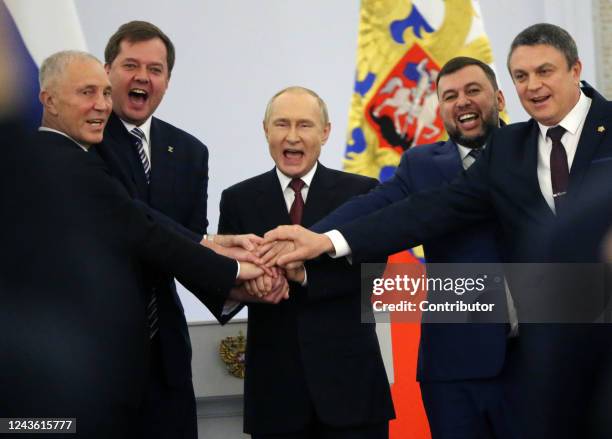 Russian President Vladimir Putin meets with Moscow-appointed heads of four Ukrainian regions, partially occupied by Russia, at the Grand Kremlin...