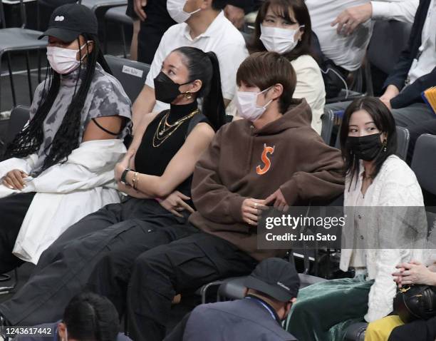 Naomi Osaka, influencer Awich, Yuto Horigome and Suzu Hirose attend the game between the Golden State Warriors and the Washington Wizards as part of...