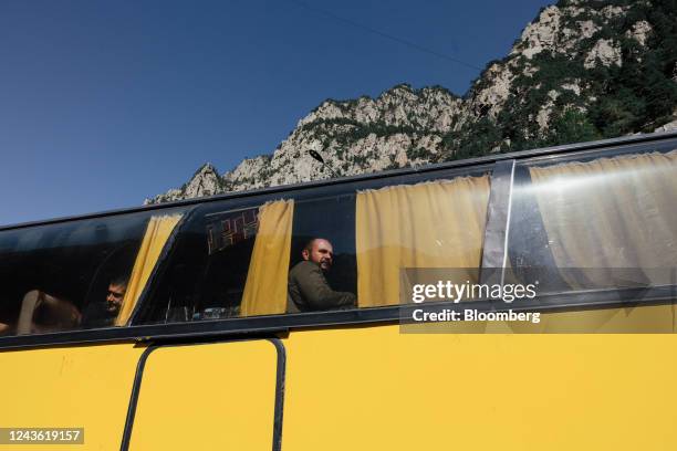 Travelers and Russian nationals onboard a coach arriving from Russia through the Verkhny Lars border crossing, travelling towards Armenia, in...