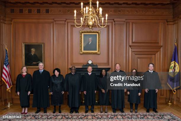 In this handout provided by the Collection of the Supreme Court of the United States, Members of the Supreme Court Associate Justices Amy Coney...