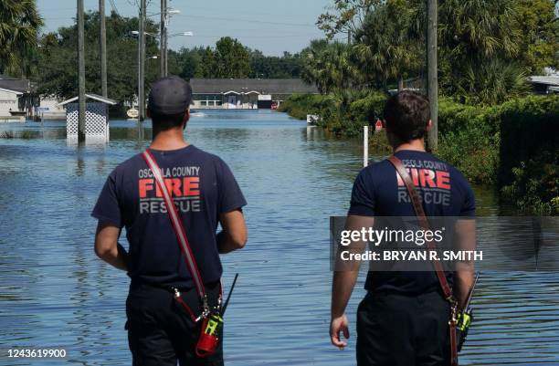 Osceola County Firefighters inspect the flooded Good Samaritan Society Village, following Hurricane Ian on September 30, 2022 in Kissimmee, Florida....