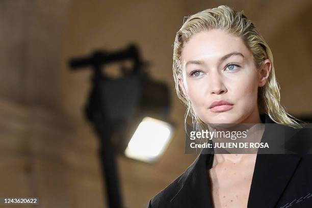 Model Gigi Hadid presents a creation for the Victoria Beckham Spring-Summer 2023 fashion show during the Paris Womenswear Fashion Week, in Paris, on...
