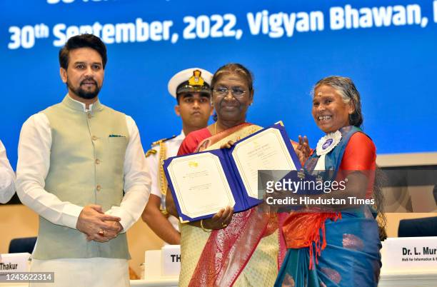 President Droupadi Murmu confers Best Female Playback Singer Award to Keralite tribal folk singer Nanjiyamma at the 68th National Film Awards...