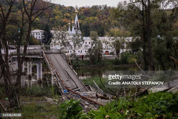 Photograph taken on September 30 shows the destroyed bridge in front of the Sviatohirsk Cave Monastery, an Orthodox Christian monastery on the bank...