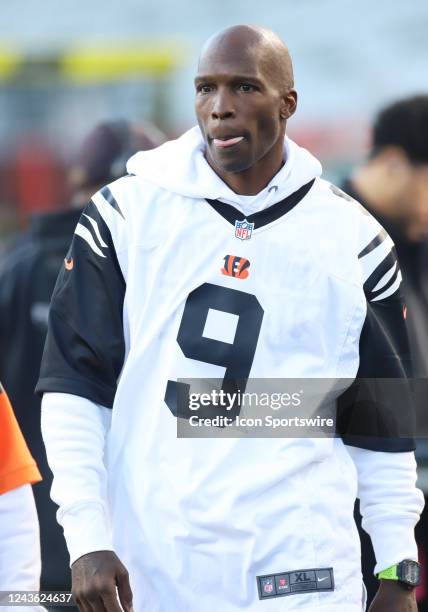 Former Cincinnati Bengals receiver Chad Johnson, also known as Chad OchoCinco, wears a Joe Burrow jersey before a game between the Miami Dolphins and...