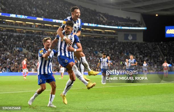 Porto's Brazilian midfielder Evanilson Barbosa celebrates scoring the opening goal during the Portuguese League football match between FC Porto and...