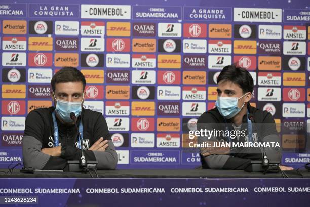 Independiente del Valle's Argentine coach Martin Anselmi and Independiente del Valle's Argentine midfielder Lorenzo Faravelli attend a presser on the...