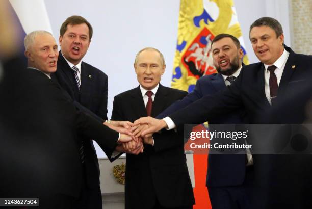 Russian President Vladimir Putin with Ukrainian separatist regional leaders Vladimir Saldo , Yevgeniy Balitsky , Leonid Pasechnik and Denis Pushilin...