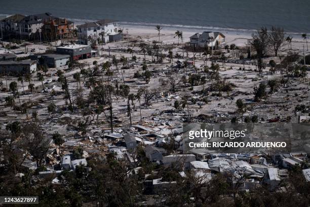 An aerial picture taken on September 30, 2022 shows a destroyed trailer park in the aftermath of Hurricane Ian in Fort Myers Beach, Florida. -...