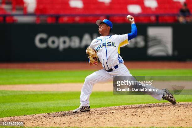 Oscar Nakaoshi of Team Brazil pitches in the seventh inning during Game One between Team New Zealand and Team Brazil at Rod Carew National Stadium on...