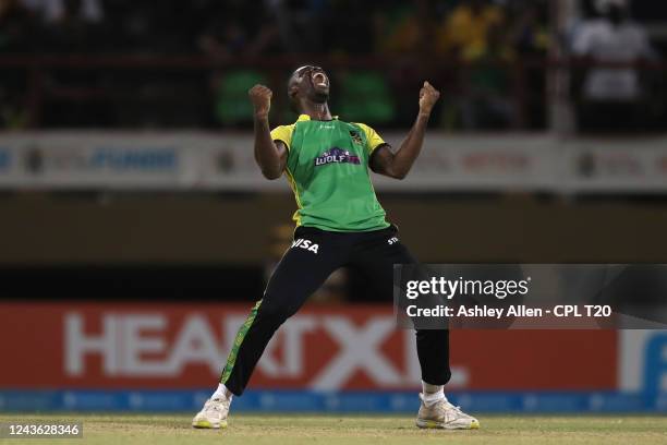 Nicholson Gordon of Jamaica Tallawahs celebrates getting the wicket of Devon Thomas of Barbados Royals during the Men's 2022 Hero Caribbean Premier...