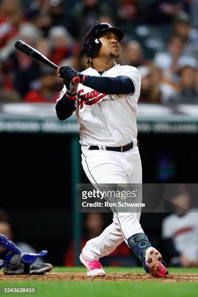 Jose Ramirez of the Cleveland Guardians hits a three-run home run off Brady Singer of the Kansas City Royals during the sixth inning at Progressive...
