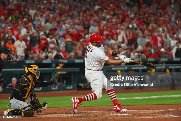 Albert Pujols of the St. Louis Cardinals hits his 701st career home run while playing against the Pittsburgh Pirates in the fourth inning at Busch...