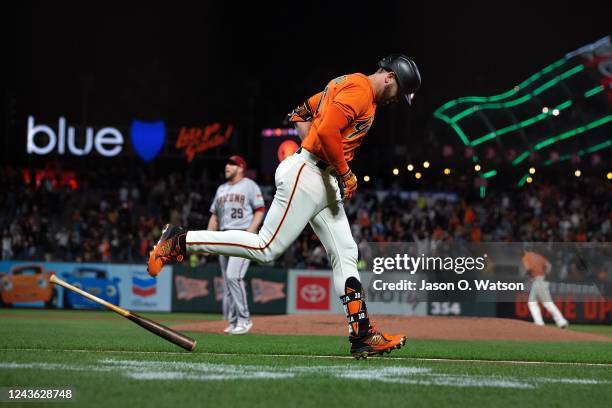 Evan Longoria of the San Francisco Giants rounds the bases after hitting a three run home run off of Merrill Kelly of the Arizona Diamondbacks during...