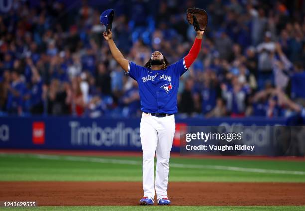 Vladimir Guerrero Jr. #27 of the Toronto Blue Jays celebrates clinching a playoff spot after the win against the Boston Red Sox at Rogers Centre on...